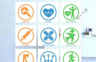Neun farbige Symbole in einem Raster, die medizinische Themen darstellen, darunter Herz, Spritze und Kreuz.